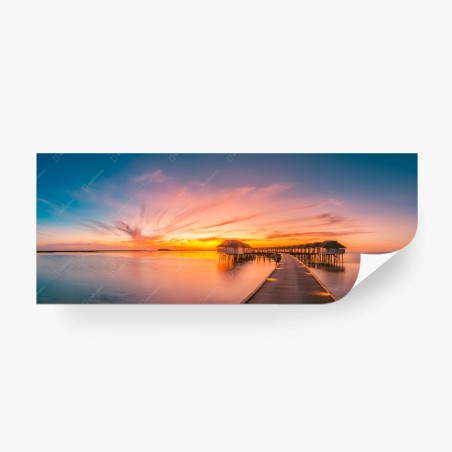 Fotomural pasarela hacia bungalows sobre el agua al atardecer – Pixers®