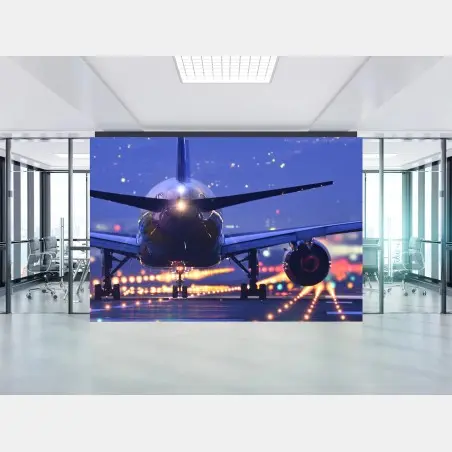 Fotomural avión en pista iluminada al anochecer – Pixers®