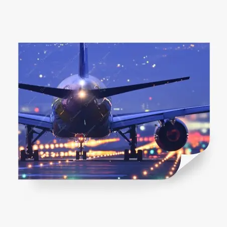 Fotomural avión en pista iluminada al anochecer – Pixers®