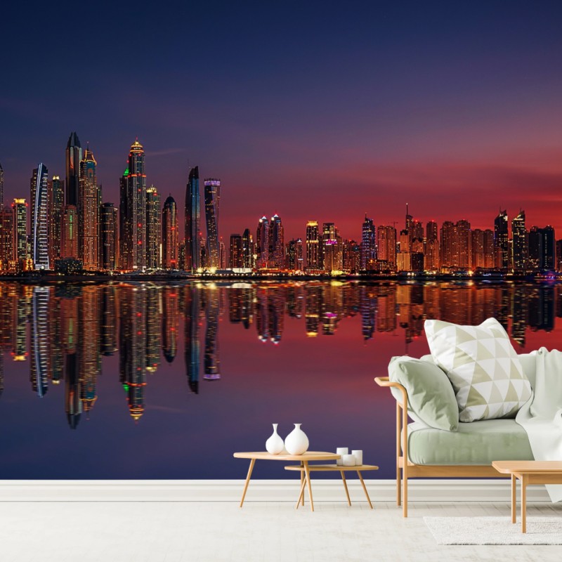 Fotomural skyline iluminado al atardecer con reflejos