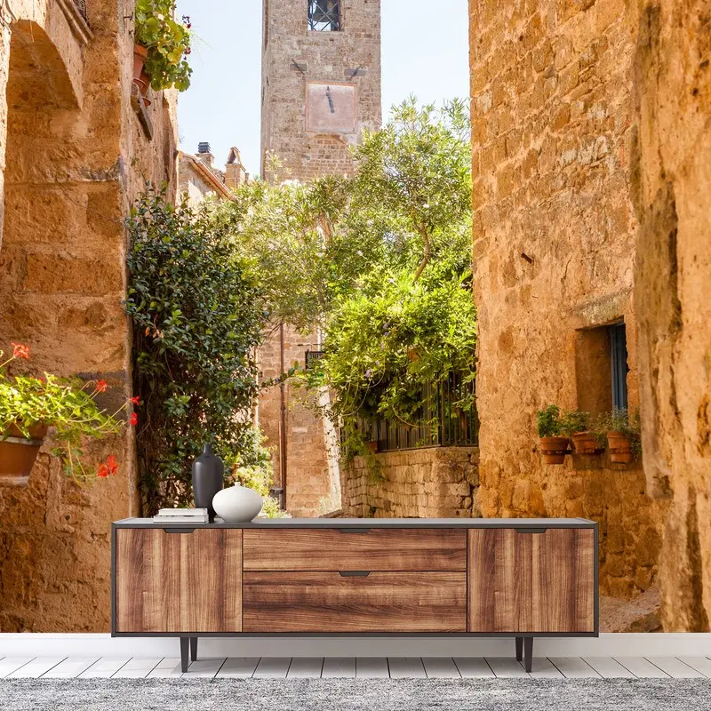 Fotomural Civita di Bagnoregio, calle medieval bañada en luz dorada
