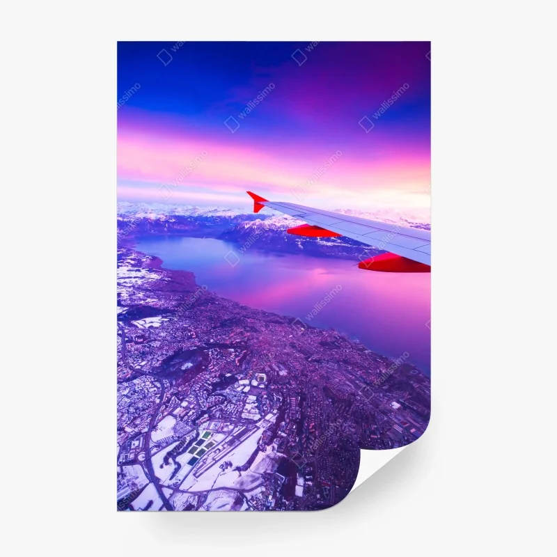Fotomural amanecer púrpura sobre lago y montañas desde el avión