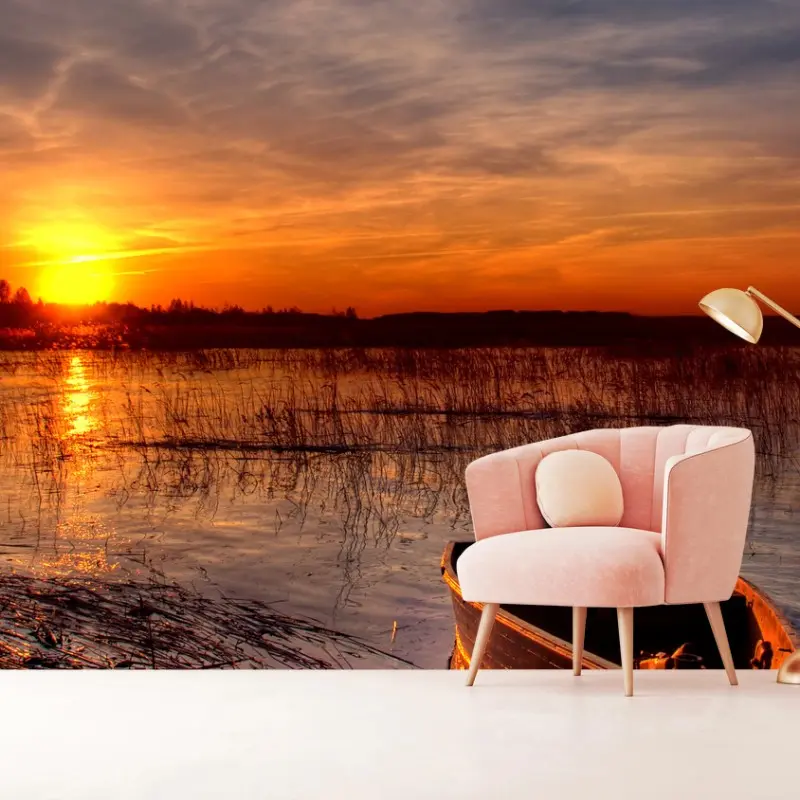 Fotomural atardecer en el lago con bote solitario