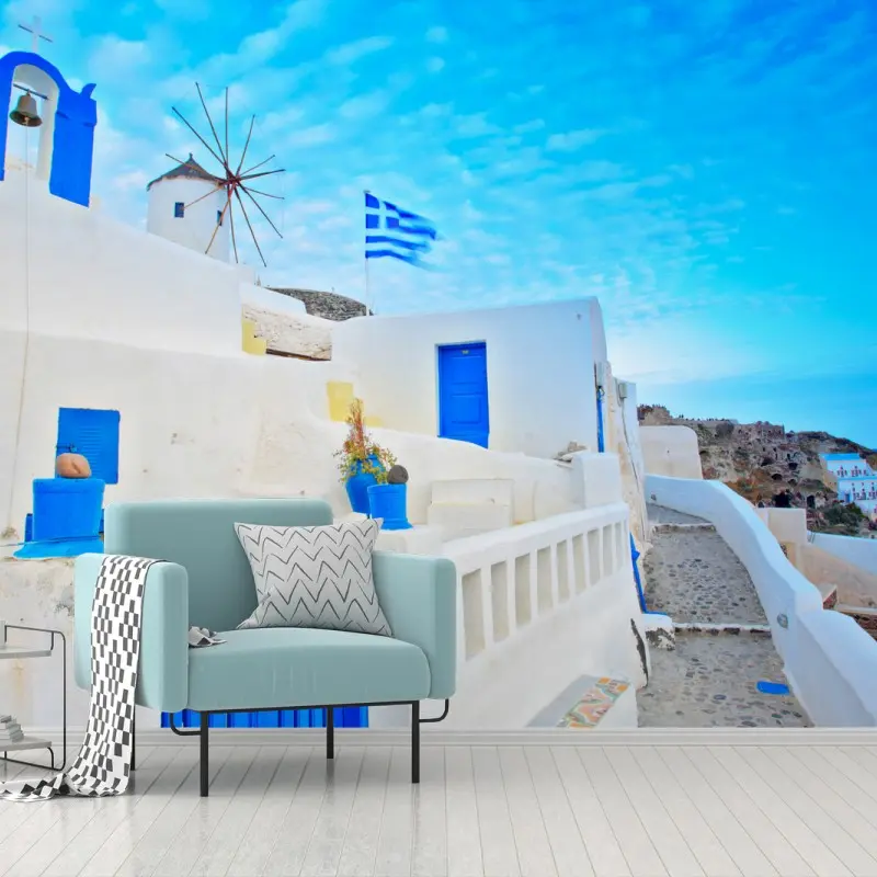 Fotomural vista costera de Santorini con casas blancas y puertas azules