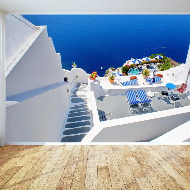 Fotomural vistas mediterráneas de Santorini en azul y blanco