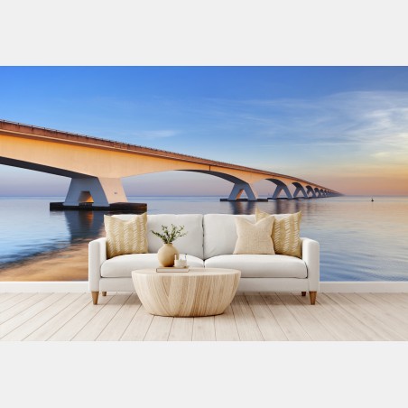 Fotomural amanecer en Zeelandbrug: puente infinito – Pixers®