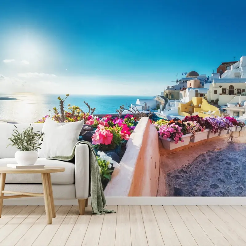 Fotomural vista mediterránea con flores y casas blancas